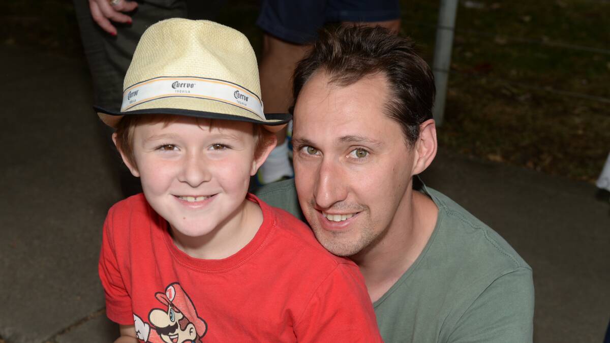 Alex Oates, 8, and Matt Oates of Ballarat at the Begonia Festival.