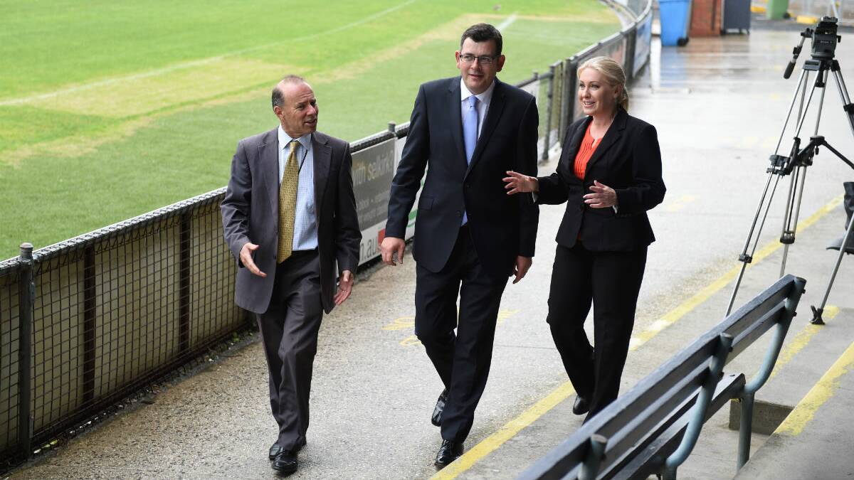 Labor politicians Geoff Howard, Daniel Andrews and Sharon Knight at Eureka Stadium. PICTURE: LACHLAN BENCE