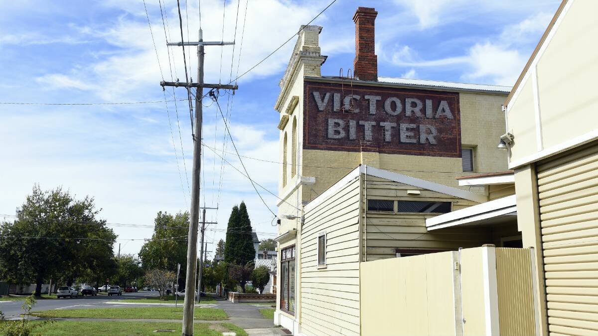 The Victoria Bitter sign on the corner of Lyons and Eyre streets. PICTURE: JUSTIN WHITELOCK