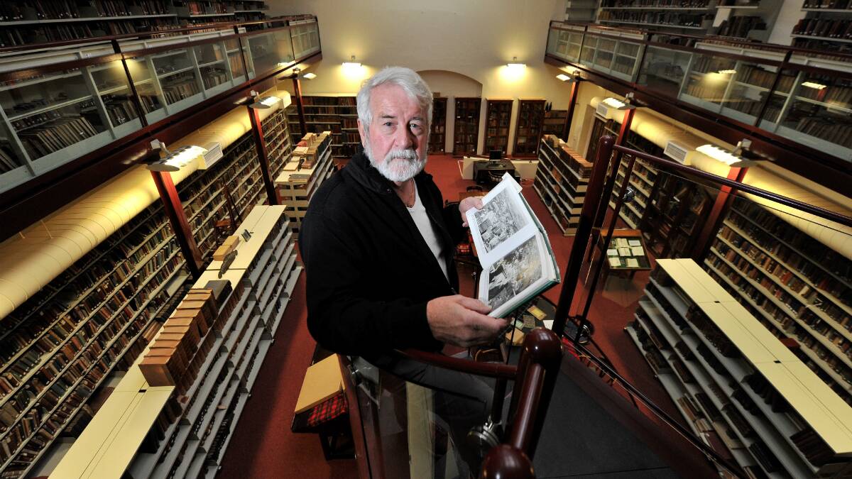 Max Harris with book Ballaarat Golden City: A Pictorial History. PICTURE: LACHLAN BENCE