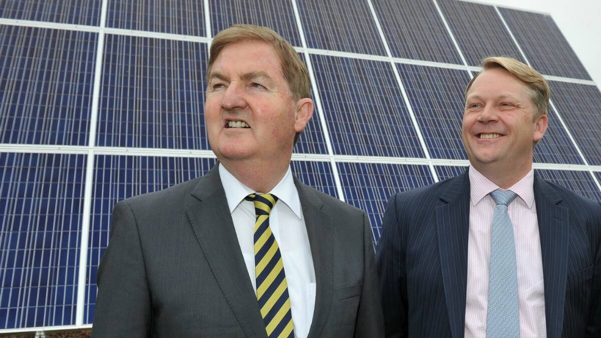 Deputy Premier Peter Ryan and Mars acting general manager Duncan Webster with the new solar panels. PICTURE: LACHLAN BENCE