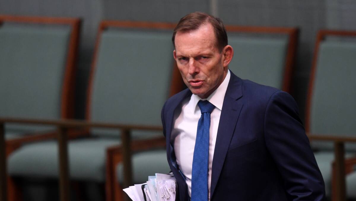 Former prime minister Tony Abbott arrives during House of Representatives Question Time at Parliament House in Canberra on Tuesday. Picture: AAP