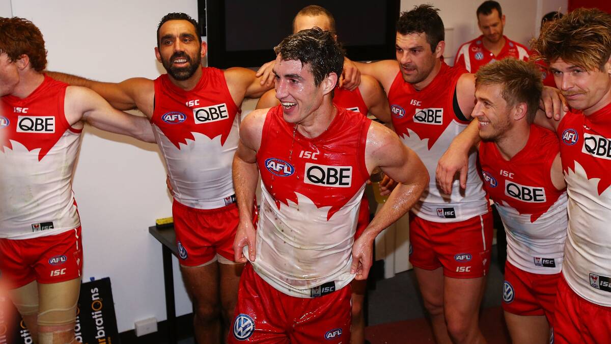 professional: Dean Towers celebrates his debut with teammates last month. PICTURE: GETTY IMAGES