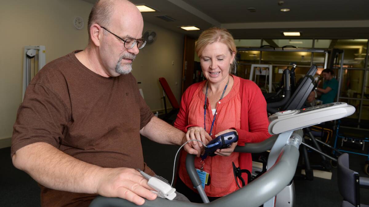Owen Dunne and cardiac rehabilitation program co-ordinator Cathy McCann test Mr Dunne’s blood pressure. PICTURE: KATE HEALY