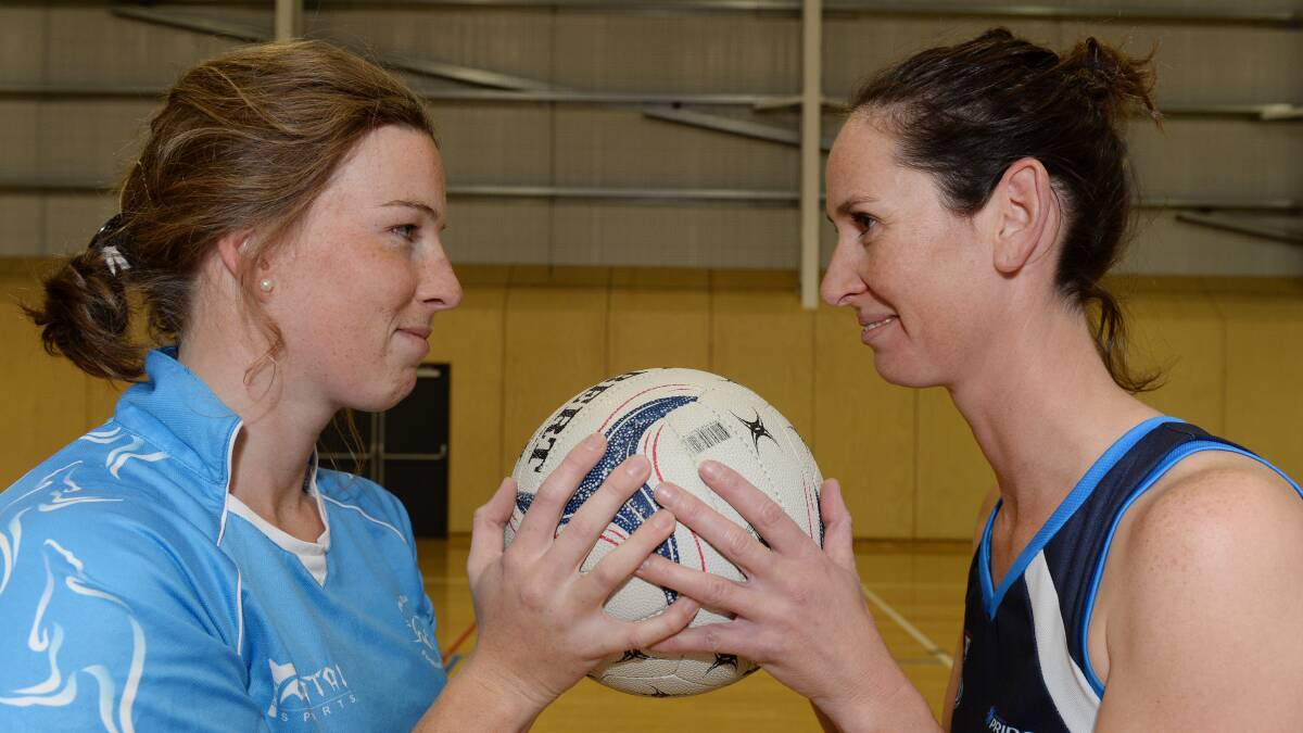 OPPONENTS: Alice Langley of FedUni and Cindy Daniel of Ballarat Pride face off before the match. PICTURE: KATE HEALY