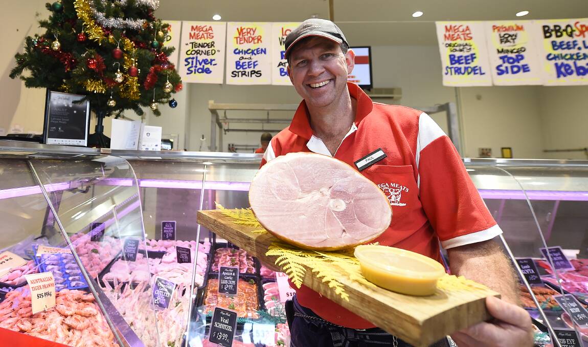 Paul Parker, from Mega Meats, with a ham ready for Christmas. PICTURE: JUSTIN WHITELOCK