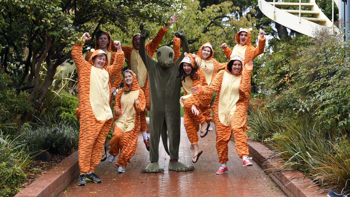 Jacob Torpey as the Goanna, centre, with uni mates Shannen Bartlett, Liam Blackwell, Edward Whyte, Josh McCallum, Marie-Therese Shields, Bridgette Fraser-O’Donnell, Rebecca White and Aaron McGregor. PICTURE: JUSTIN WHITELOCK