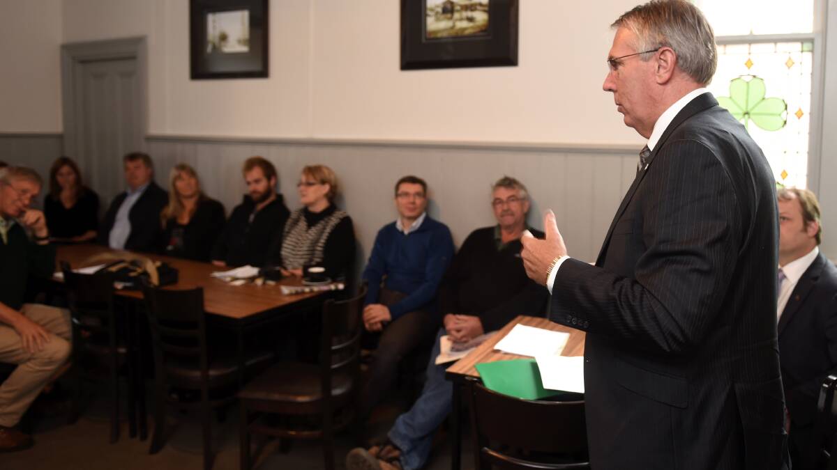 Agriculture Miniter Peter Walsh talks to residents at yesterday’s forum. PICTURES: LACHLAN BENCE