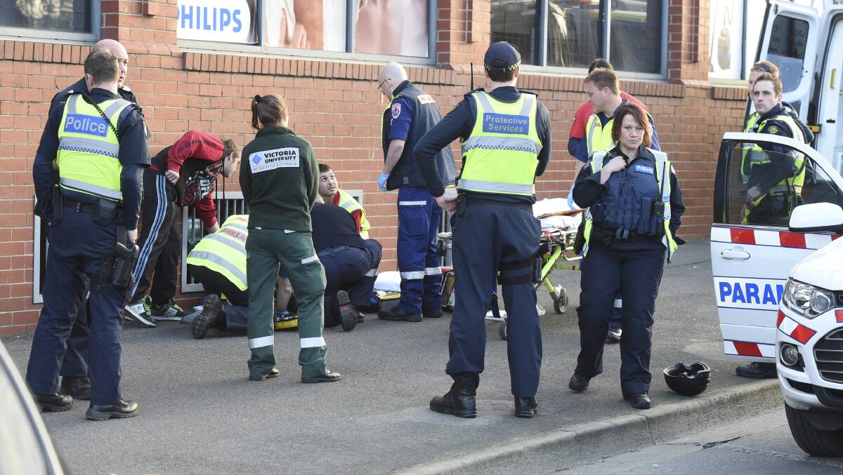 A foot chase between protective services officers and a 19-year-old man near Ballarat station ended badly on Thursday, with the man hit by a car. The man was reportedly found with spray paint. PICTURE: LACHLAN BENCE