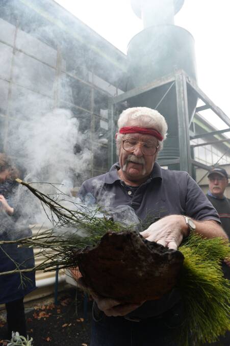 Uncle Bryon Powell performs the smoking ceremony. PICTURE: ADAM TRAFFORD