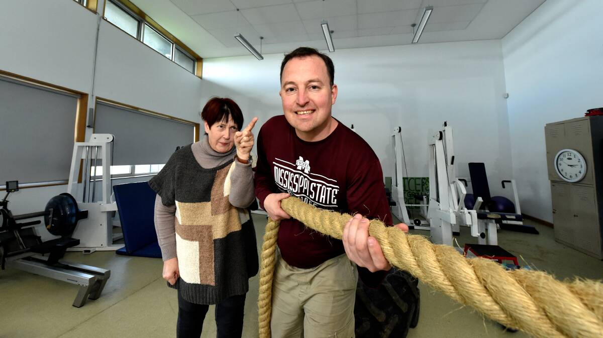  Ballarat Neighbourhood Centre work and learning advisor Jan Simmons cracks the whip on participant Clinton Young. PICTURE: JEREMY BANNISTER 