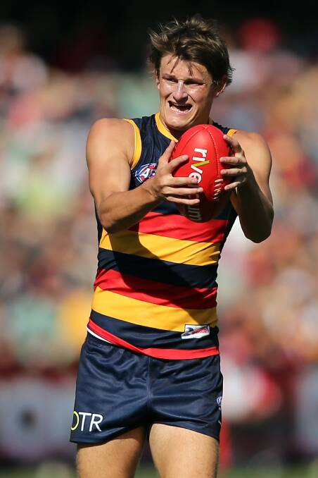 Matt Crouch has played three AFL games and is averaging 23 disposals. PICTURE: GETTY IMAGES