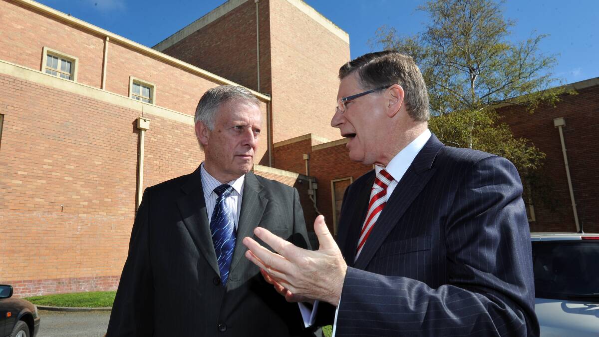 City of Ballarat mayor John Philips and Premier Denis Napthine discuss the Coalition’s plan to move the VicRoads headquarters to the Civic Hall site. PICTURE: LACHLAN BENCE