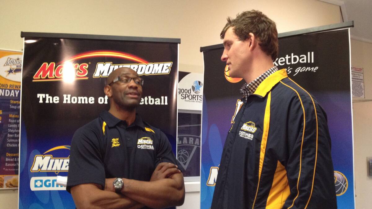 Club legend and newly appointed Ballarat Miners head coach Eric Hayes talks tactics with captain Liam Gibcus on Wednesday morning.