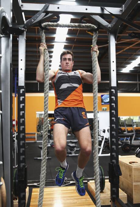 DOING THE WORK: GWS Giant Jeremy Cameron keeps his body in peak condition for a five-year contract extension in the AFL. Photo: Getty Images