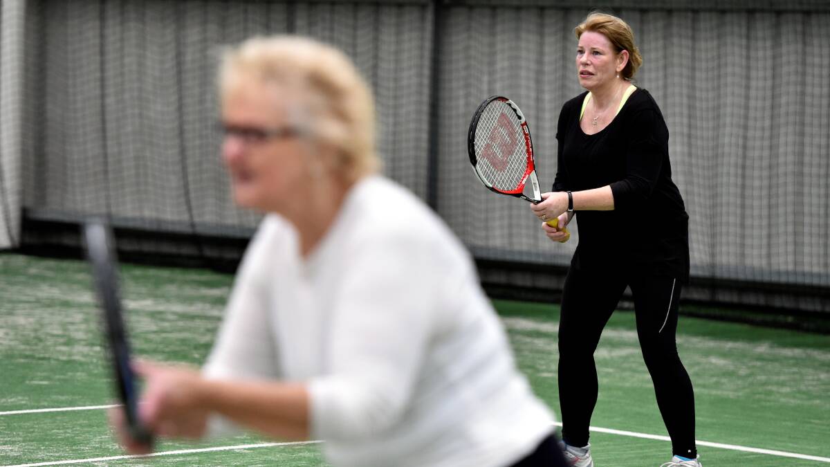 Jenny Evenden and Denise Wren in action at Tennis Ballarat. Photo: Jeremy Bannister