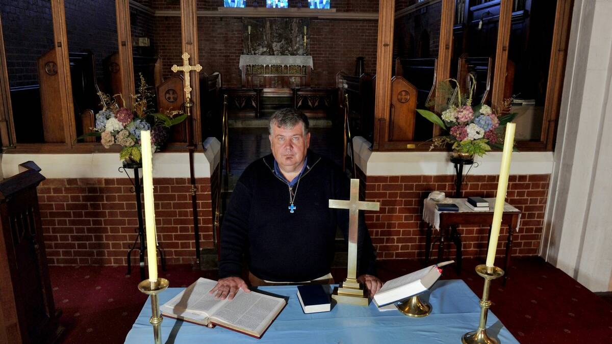 The Anglican Church was the target of a robbery where several ireplaceable items were stolen. Pictured is current parish priest Father Jeff O'Hare. PICTURE: JULIE HOUGH