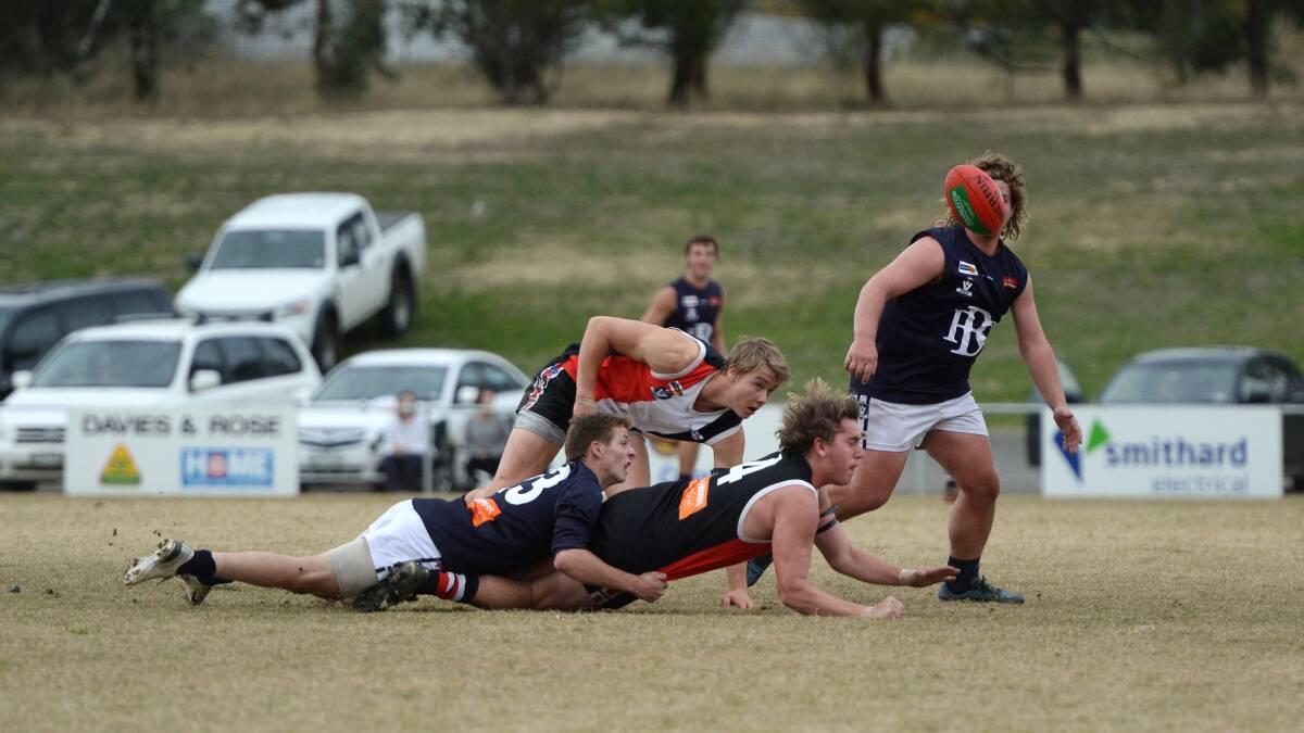 Jacob Wilkinson (Ballan) takes down Liam Hepworth (Creswick) earlier this season in a clash at Doug Lindsay Recreation Reserve. Hepburn Shire Council is confident the Wickers will not be forced to move any home games away from the venue in 2014.