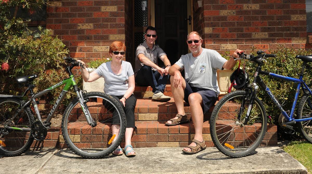 Barry and Trish Watts, with son Jason, will ride in the Ballarat Cycle Classic in honour of their daughter Rebekah. PICTURE: JUSTIN WHITELOCK