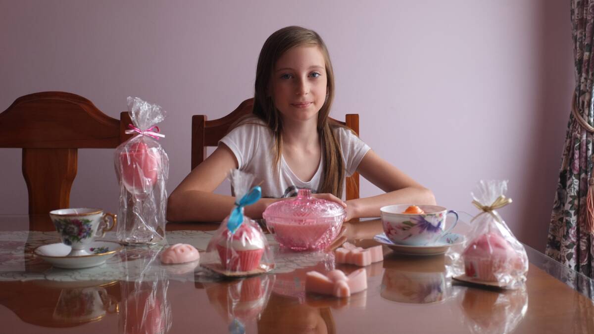 Grade six pupil Ebony Calaby is helping promote Paint ’Em Pink to raise awareness of acquired brain injuries. Ebony sells candles that she makes herself.