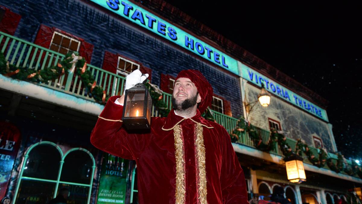 Christmas cheer: Tim Harris in costume at Sovereign Hill’s Christmas in July lights show. 