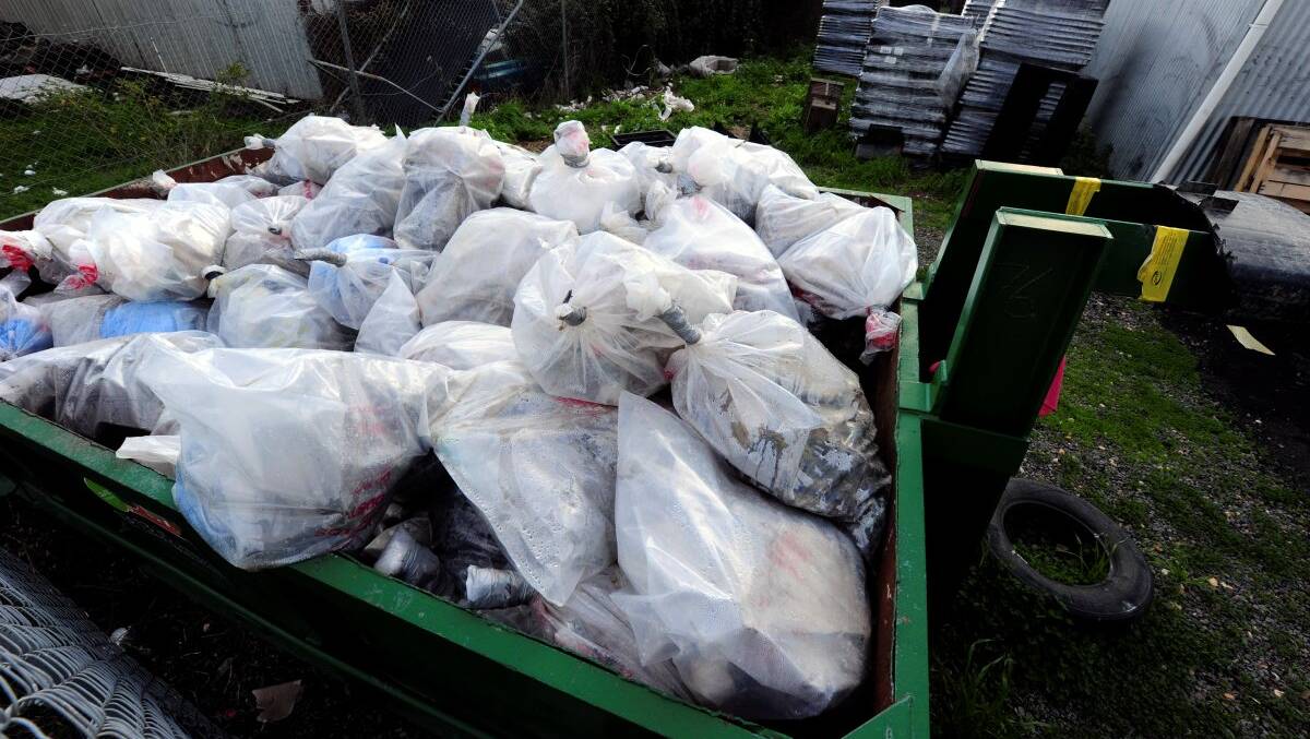 Another skip bin full of asbestos bags left unsecured in Sebastopol. PICTURE: JEREMY BANNISTER