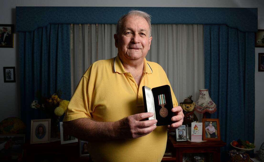 National Servicemen's Association Ballarat sub branch secretary Ron Douglas believes one of the medals may belong to Ballarat's Murray Dyer. PICTURE: ADAM TRAFFORD.
