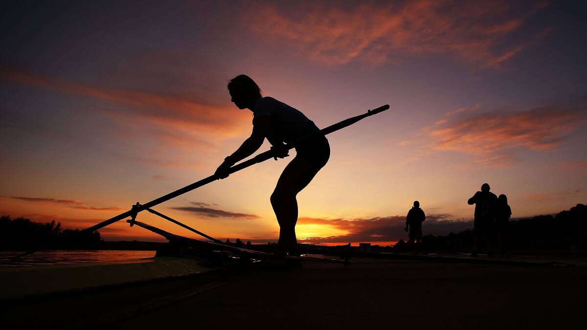 Crews head out for early morning training before the Rowing World Cup at the Sydney International Rowing Centre on March 30. Photo: Getty
