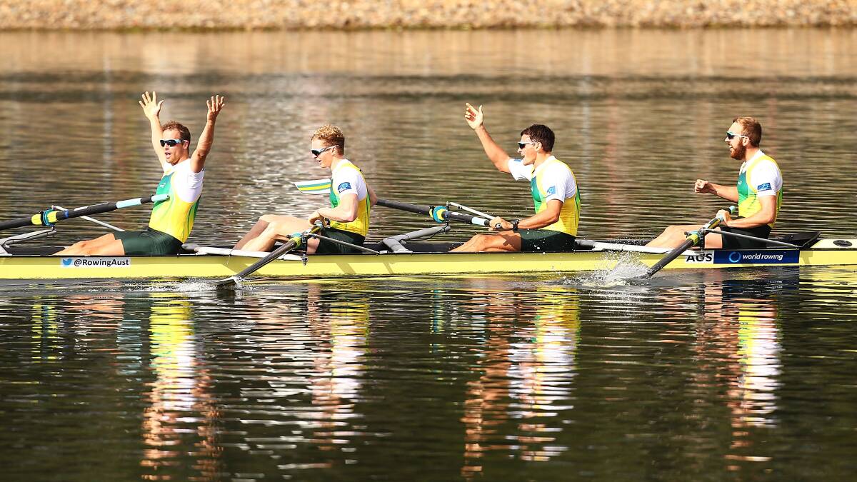 Alexander Lloyd, Spencer Turrin, Alexander Hill and Angus Moore of Australia celebrate winning the Mens Four race. Photo: Getty