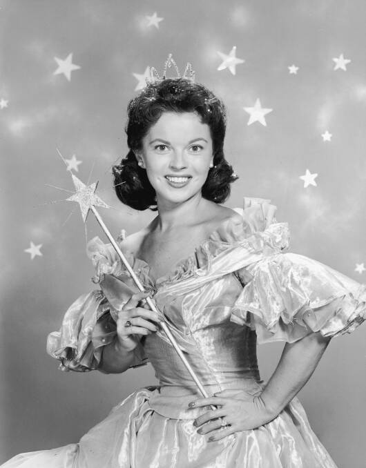 Shirley Temple wears a fairy godmother costume in a promotional portrait for her television series of dramatized fairy tales, 'Shirley Temple's Storybook'. Picture: Getty Images