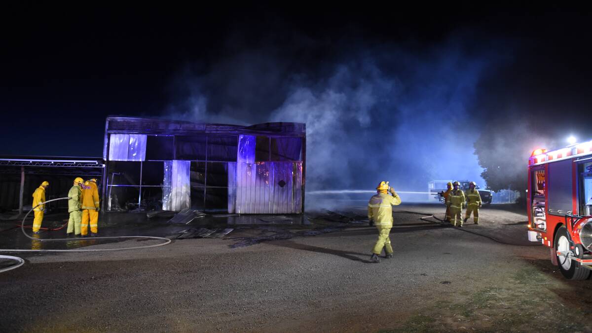 Fire crews at the scene of the blaze at a Windermere piggery last night. PICTURE: JUSTIN WHITELOCK