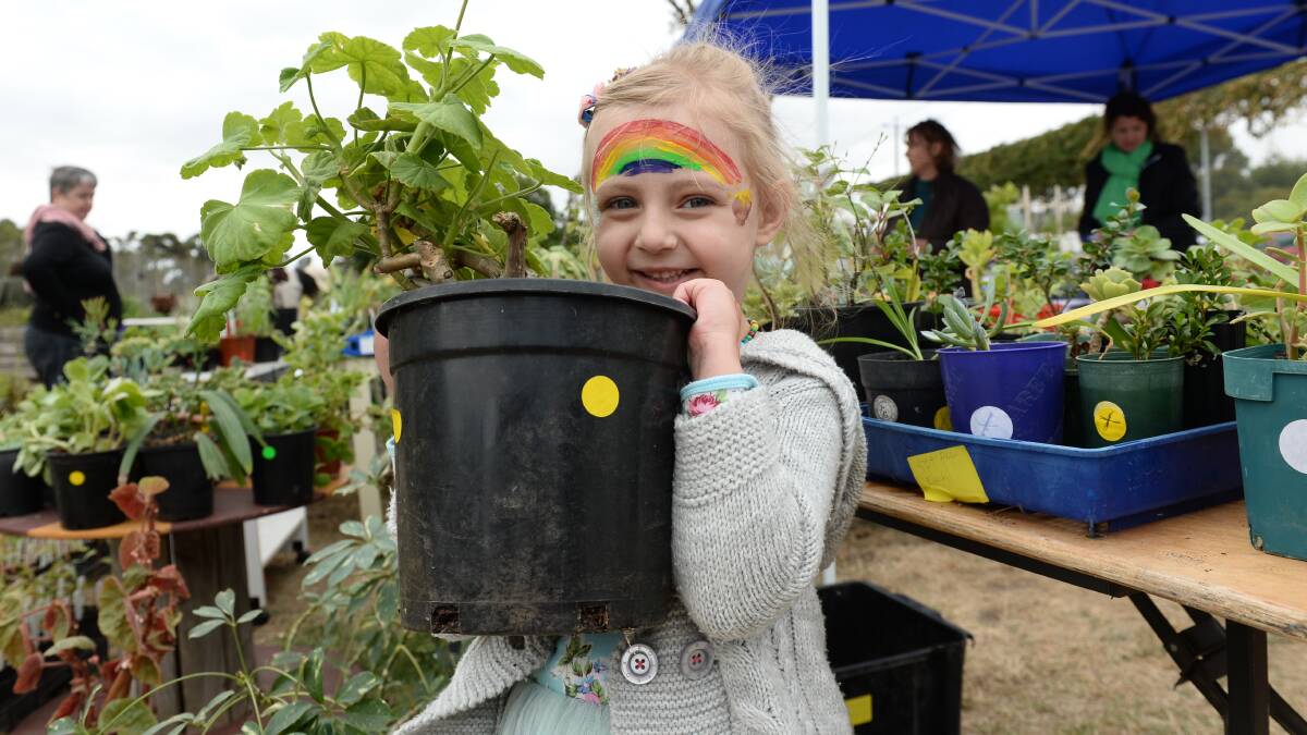  Anastasia Lohmann, 4, enjoying the Ballarat Community Garden Harvest Festival.