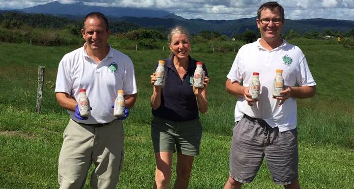Alain Martignier, operations and plant manager, Michelle Bell-Turner, PR and marketing and Tim Holt, production supervisor, celebrate the launch of Mungalli Creek Dairy's new biodynamic flavoured milk.