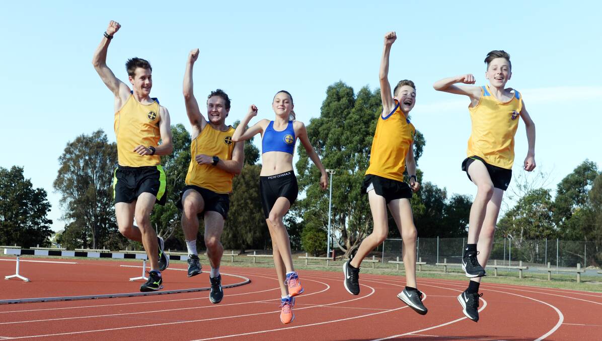 INSPIRED: Eureka athletes Will Barber, Hein Reimert, Gracie-Lee Egner, Ben Ludbrook and Ben Mornane have been cheering Kathryn Mitchell from her training ground here, at Llanberris Reserve, to the Gold Coast. Picture: Kate Healy