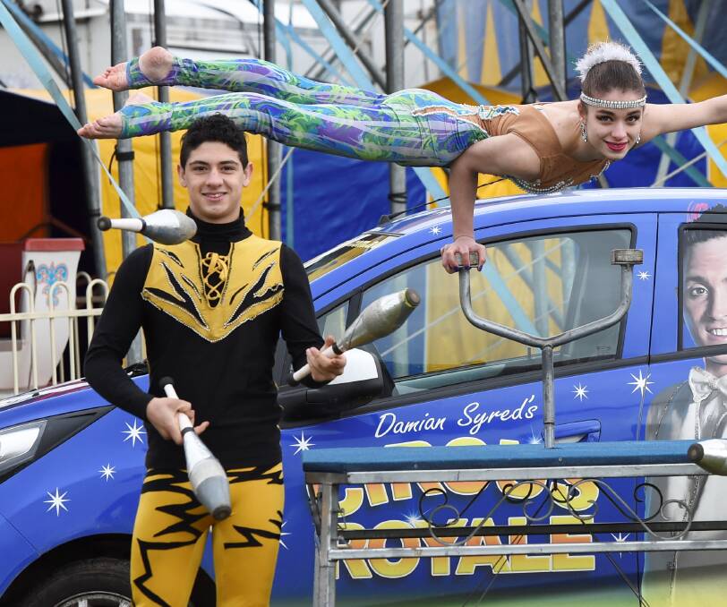 BIG TOP FAMILY: Francisco Reyes, Susana Reyes, Jonathan Reyes show off some of their Circus skills. PICTURE; Lachlan Bence