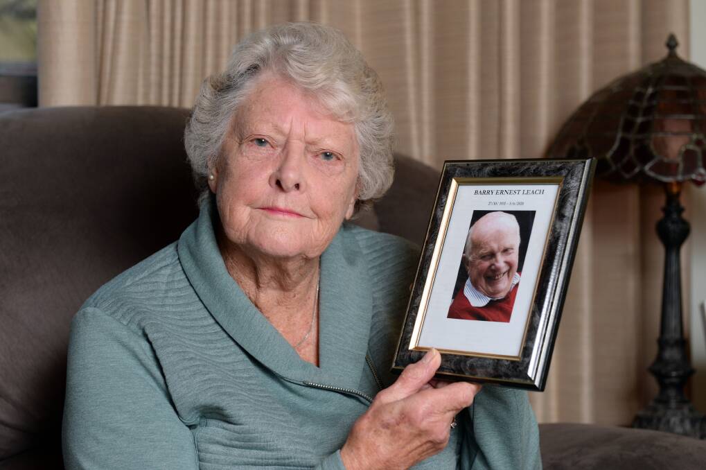 SUPPORT: Bev Leach holding a photo of her late husband Barry Leach who she was able to care for at home thanks to the support of Ballarat Hospice Care. Picture: Kate Healy