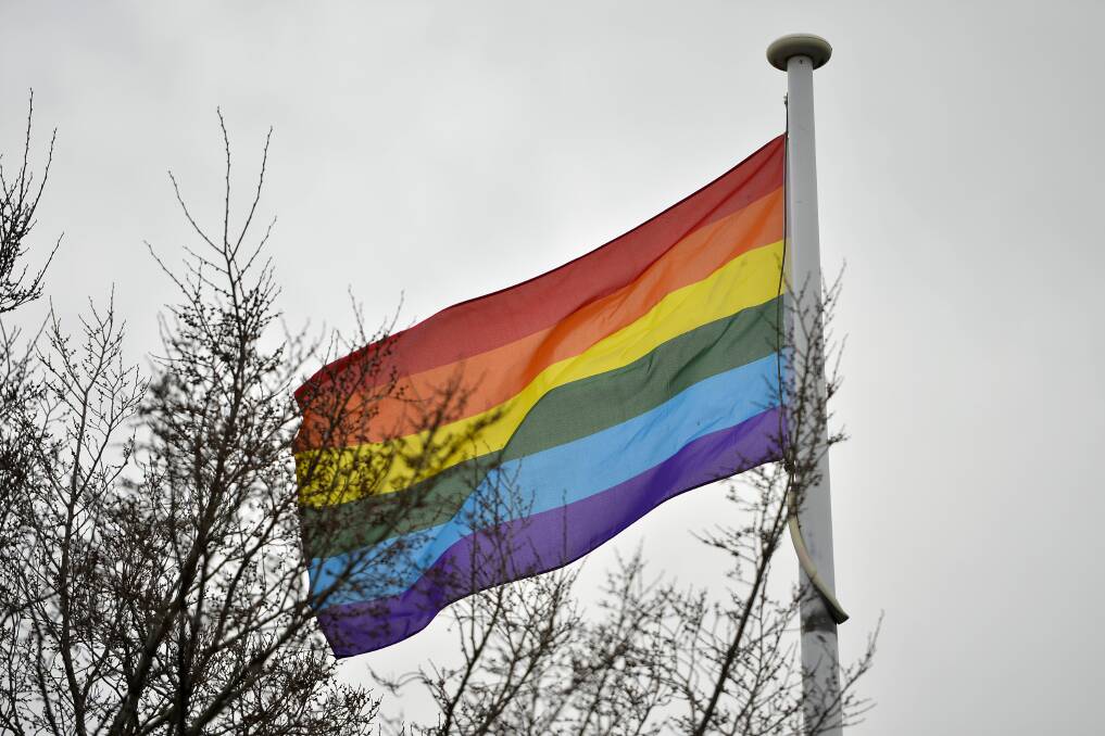 The flag issue at town hall has become a crucible in whether same-sex marriage should unite or divide people.