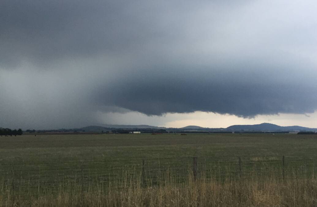 Storm clouds roll in toward Ballarat near Ascot. Picture Caleb Cluff