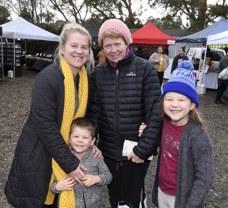 Out and about: Lauren and four-year-old Lukas Stancliffe, with Robyn Stanley and seven-year-old Kaylee Stancliffe at the Ballan Farmers Market. Picture: Lachlan Bence