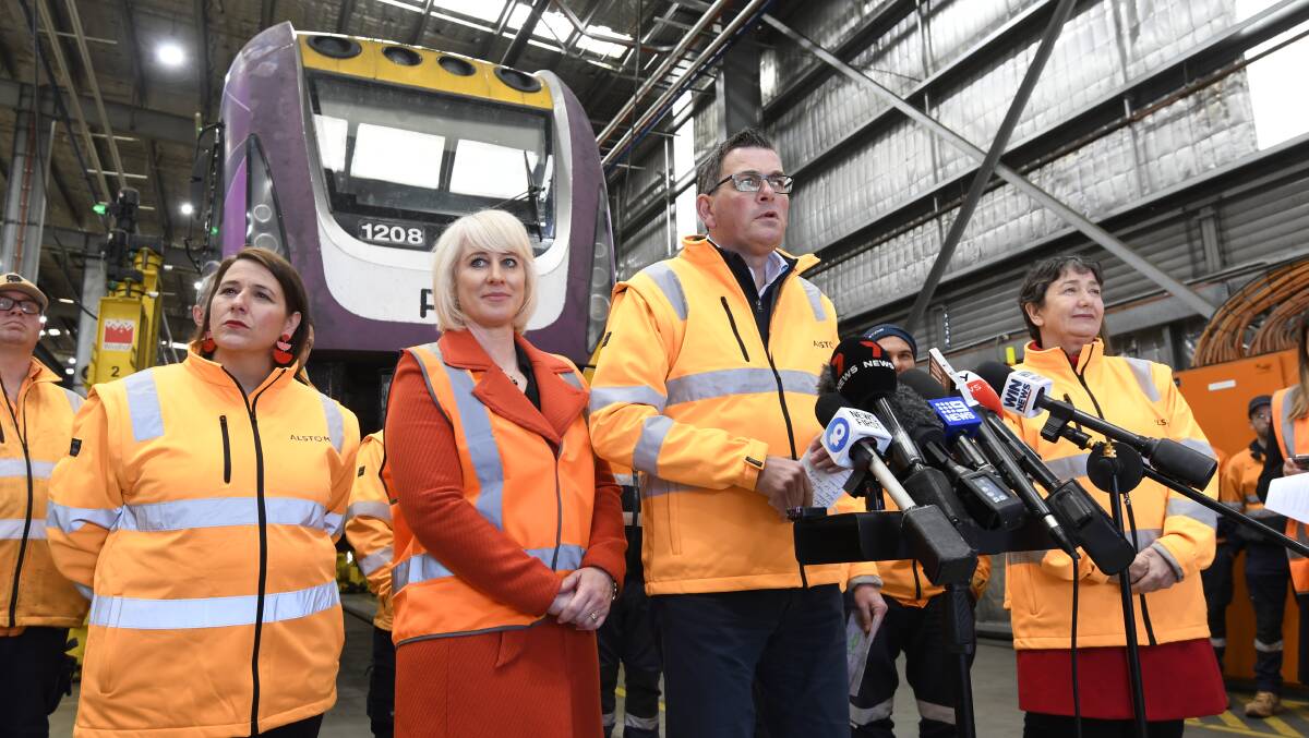 Daniel Andrews with his wife Catherine and local members Juliana Addison and Michaela Settle at Bombardier in Ballarat East. Picture by Lachlan Bence .