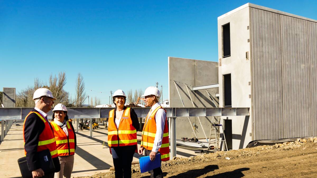 Geoff Howard. Pictured with Ian Kennedy, Development Manager, Pellicano Group, and 
 candidiates Julianna Addison and Michaela Settle at the latest works on the Railway precinct site.