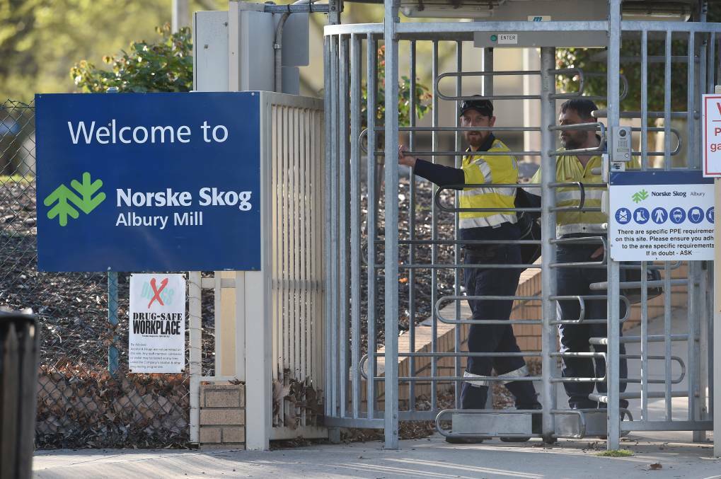 SADNESS: Norske Skog workers leave the plant at Albury earlier this month after they were told the mill would cease production by December before assets were handed over to Visy in the first quarter of 2020. Picture: THE BORDER MAIL