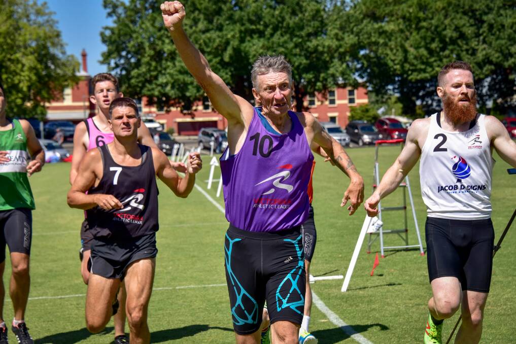 64-year-old Les Williams wins the 400m open handicap at the the Ballarat Gift. Pictures: Brendan McCarthy