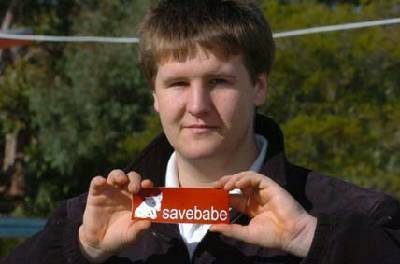 RALLYING SUPPORT: Daylesford Secondary College vice-captain and the founder of the Save Our Pig and Cow campaign, Freeman Trebilcock, with a sticker supporting his stance.