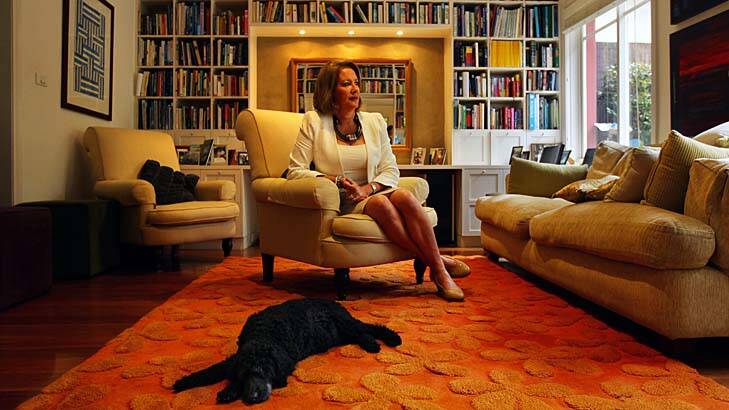 Bookish type ... Liz Broderick at her Hunters Hill family home with Billy, the ageing family poodle.