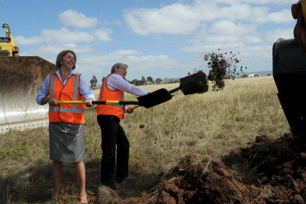 Ballarat MHR Catherine King helps Prime Minister Kevin Rudd. Picture: Jeremy Bannister