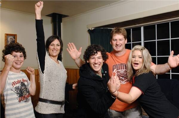GEELONG BOUND: North Ballarat Rebels' Josh Cowan, centre, celebrated last night with brother Joel, left, mother Jenny, father Steven and sister Maddy. Picture: Zhenshi van der Klooster