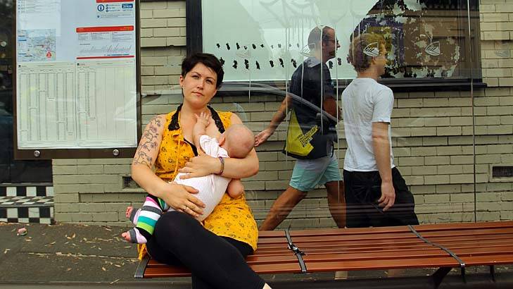 Protesting … Ash Zuko with baby Akiva.