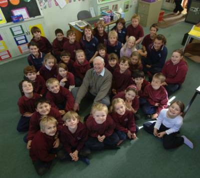 GOODBYE: Mt Blowhard Primary School pupils give long-serving school coommunity member Tom Ford a fond farewell after 46 years of continuous service.