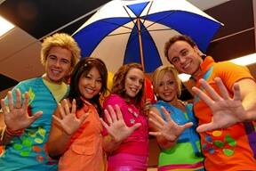 COLOURFUL SHOW: Members of children's group, Hi-5, from left, Stevie Nicholson, Sun Park, Casey Burgess, Kellie Hoggart and Nathan Foley in Ballarat yesterday to perform for hundreds of children and parents.